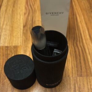 Givenchy set of makeup brushes in velvet tube.